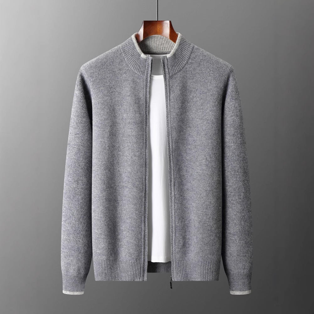 wool cardigan with ribbed hem and sleeve details shown from above on flat surface