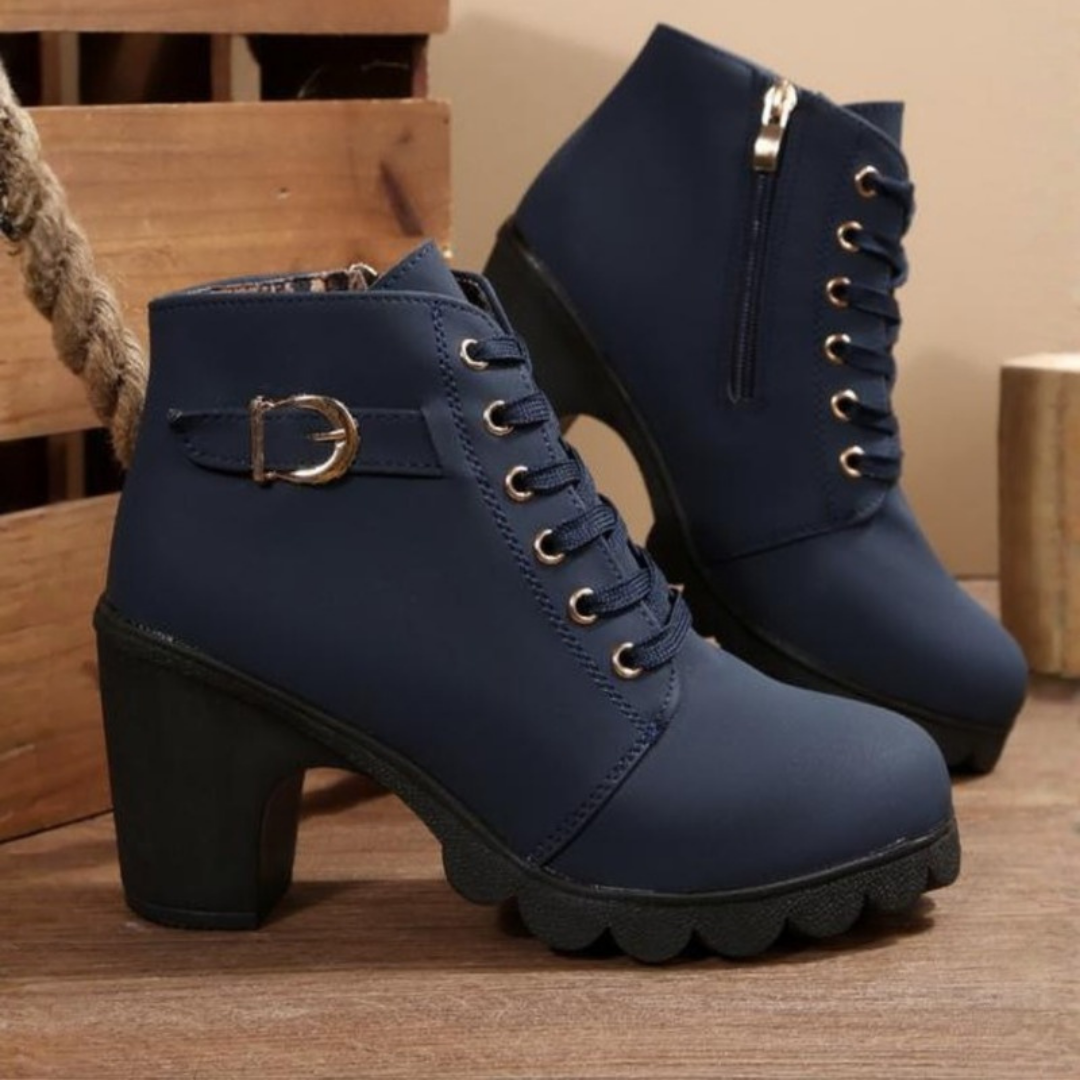 Women's blue chunky ankle boots featuring lace-up and zipper fastening with metal buckle detail