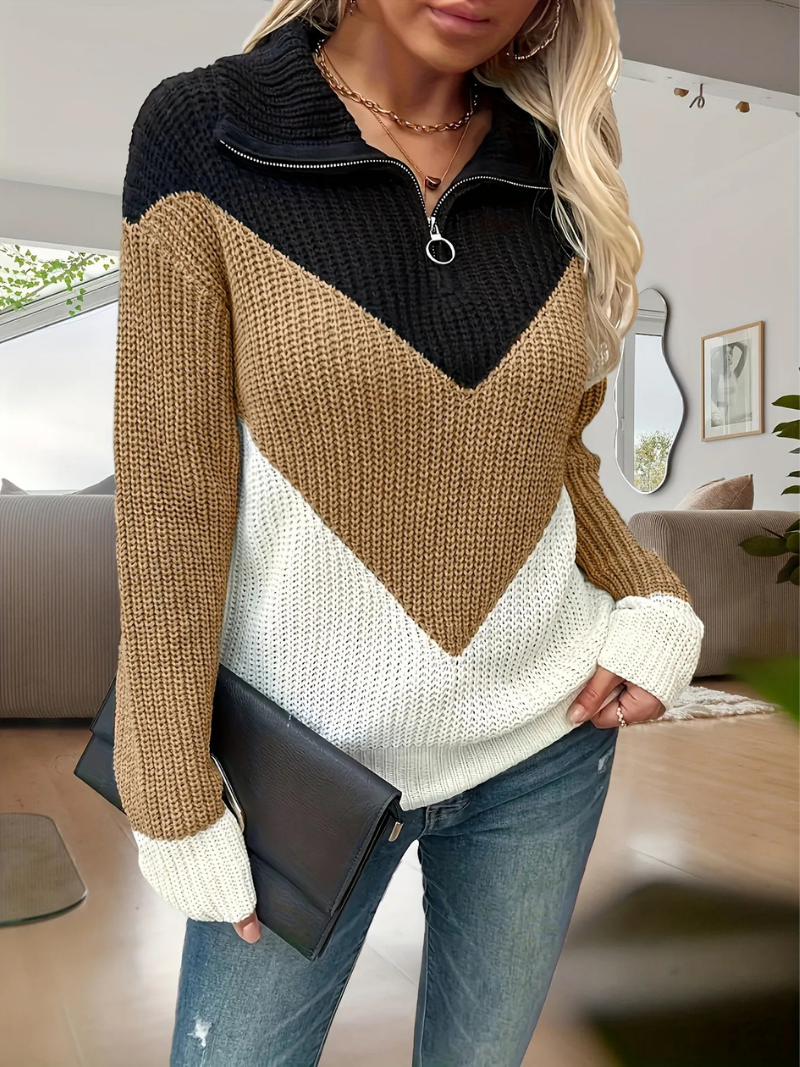 Rear view of ribbed knit jumper showing elasticated hem and cuffs with fitted shape