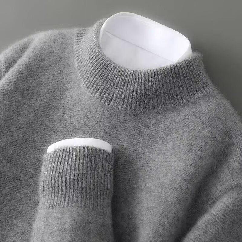 Classic fit wool knitwear with ribbed collar and sleeve cuffs