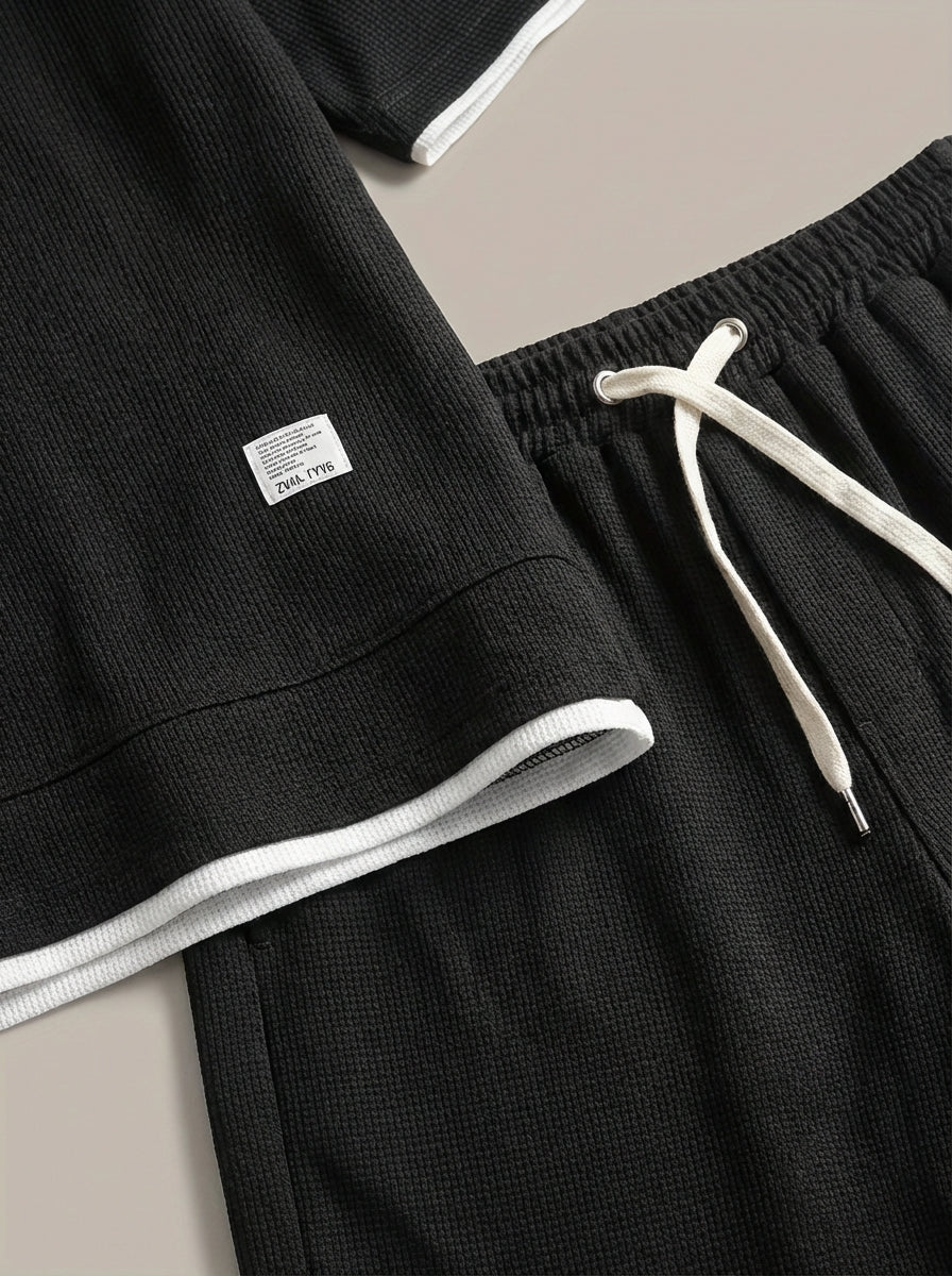 Men's slim fit two-piece set in black with short-sleeve T-shirt and matching shorts