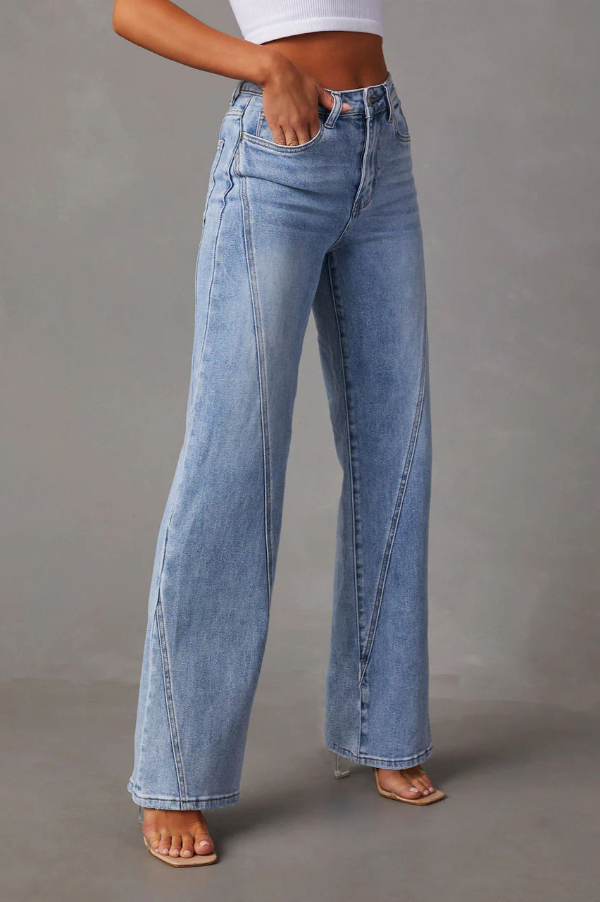 High-waisted denim jeans featuring wide leg silhouette for casual wear