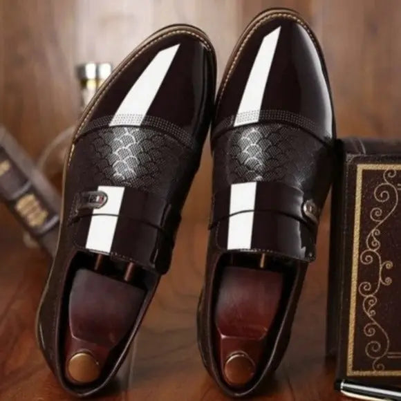 patent leather dress shoe angled view displaying sleek silhouette with slip-on design and smooth finish