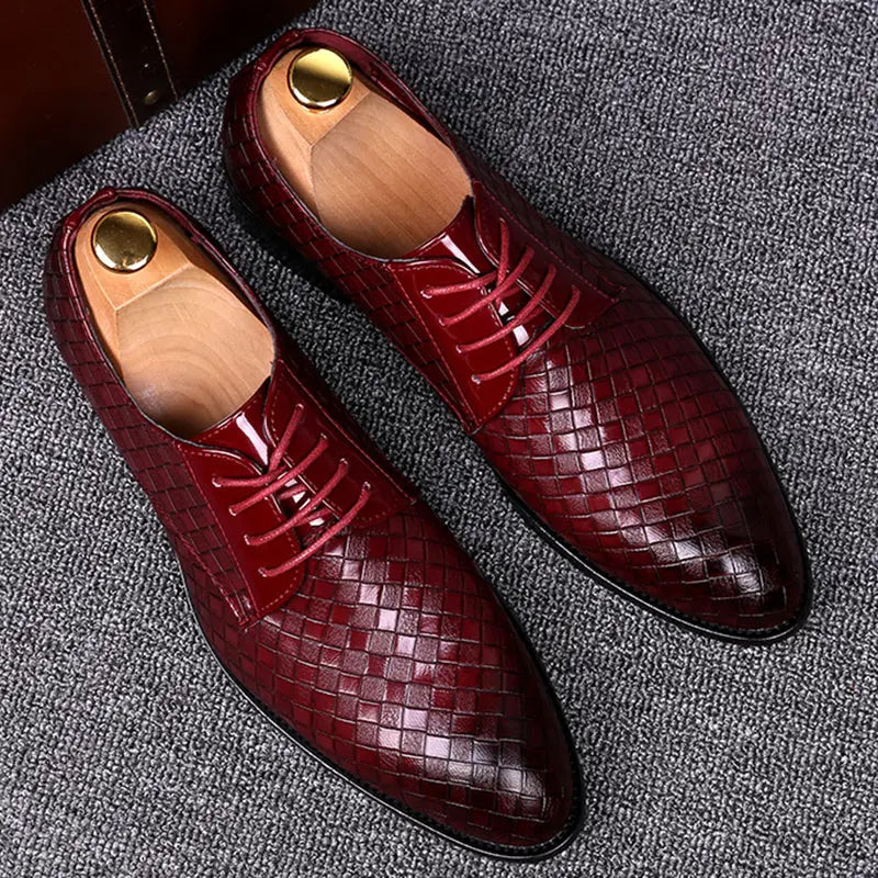 embossed leather oxford shoe with laces top perspective view