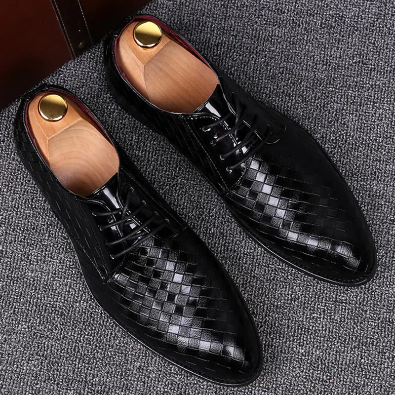 leather oxford shoe with embossed detailing side profile view