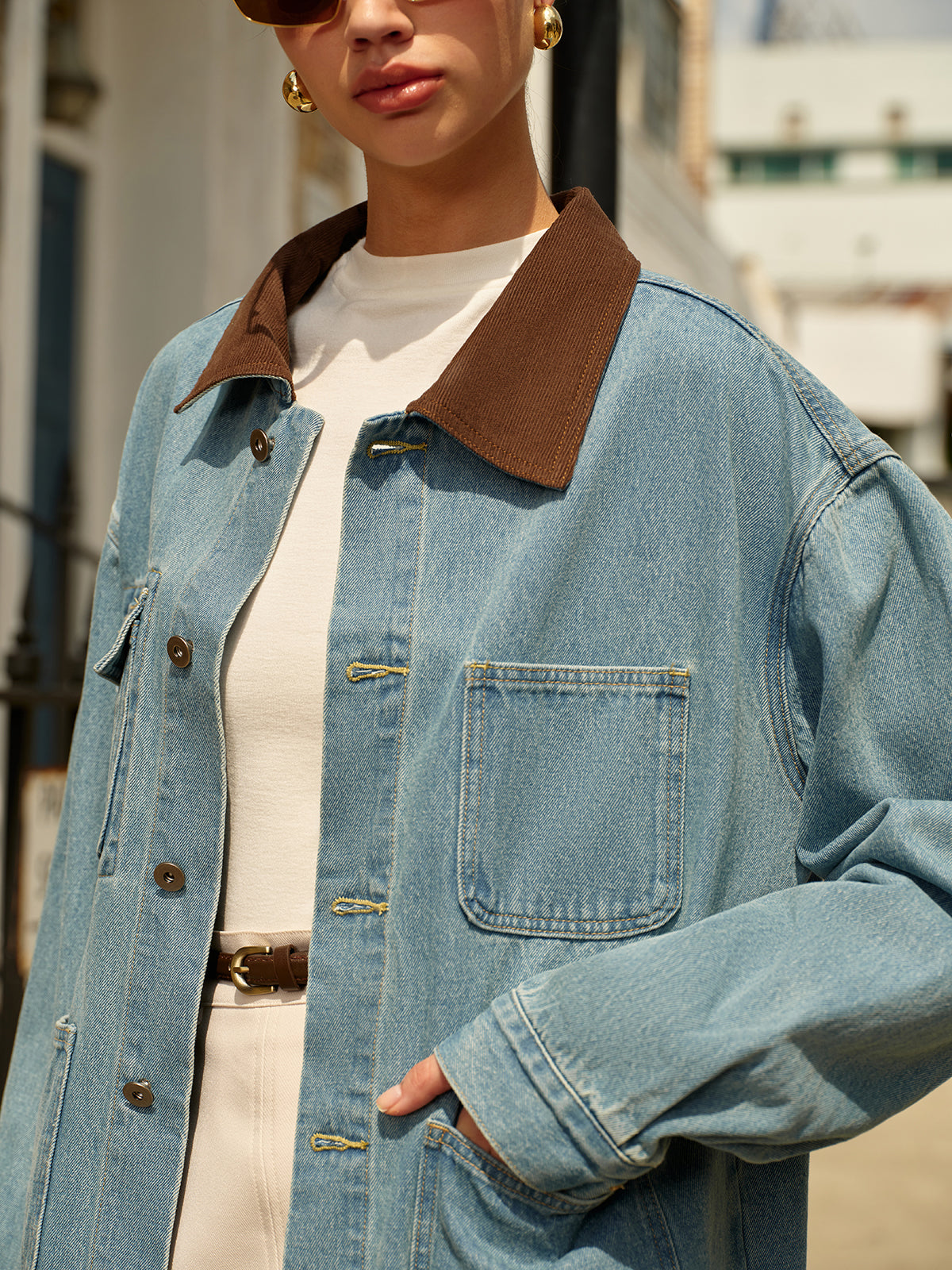 Side profile of a cotton denim jacket with a regular fit and contrast collar detail