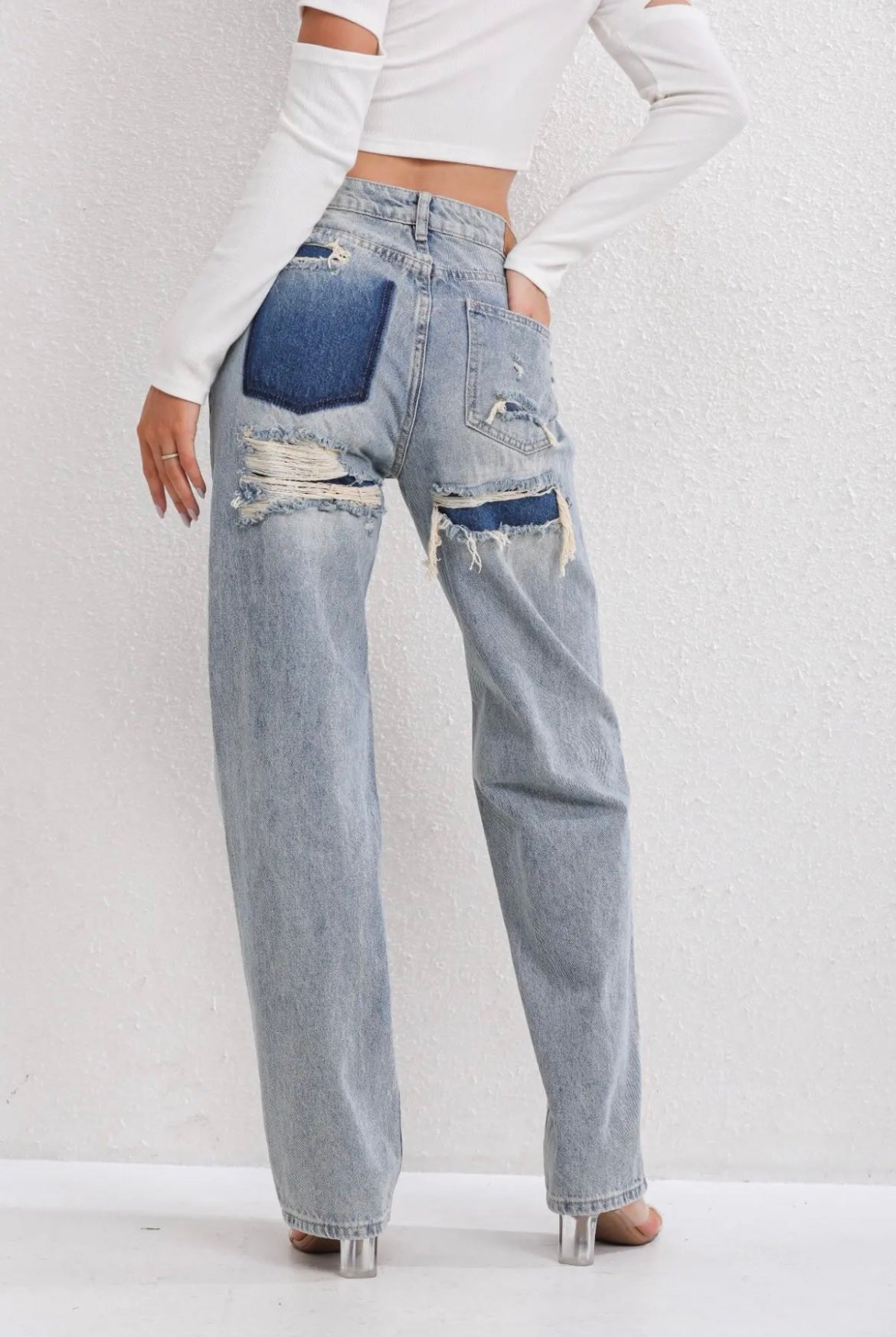 Spandex women's jeans in vintage ripped style – back view