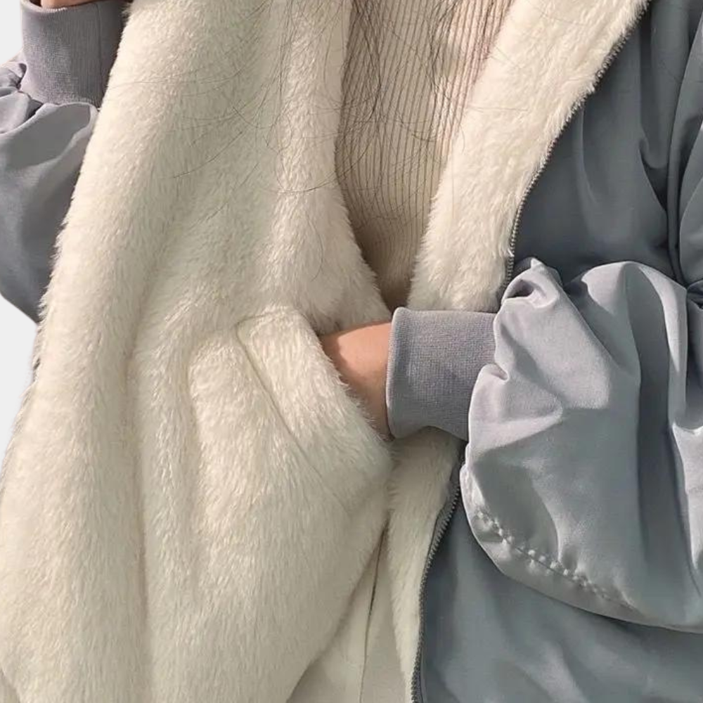 Insulated jacket with drawstring waist and patch pockets