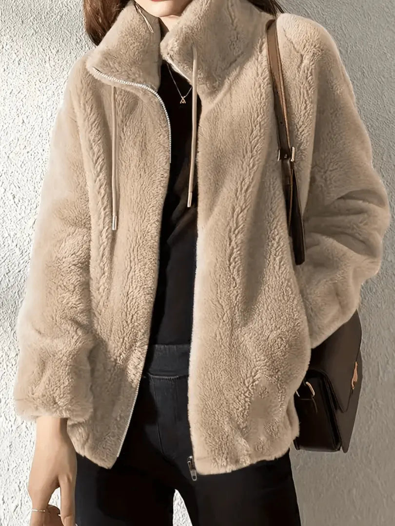 fleece jacket with zip front and high neck shown from front angle