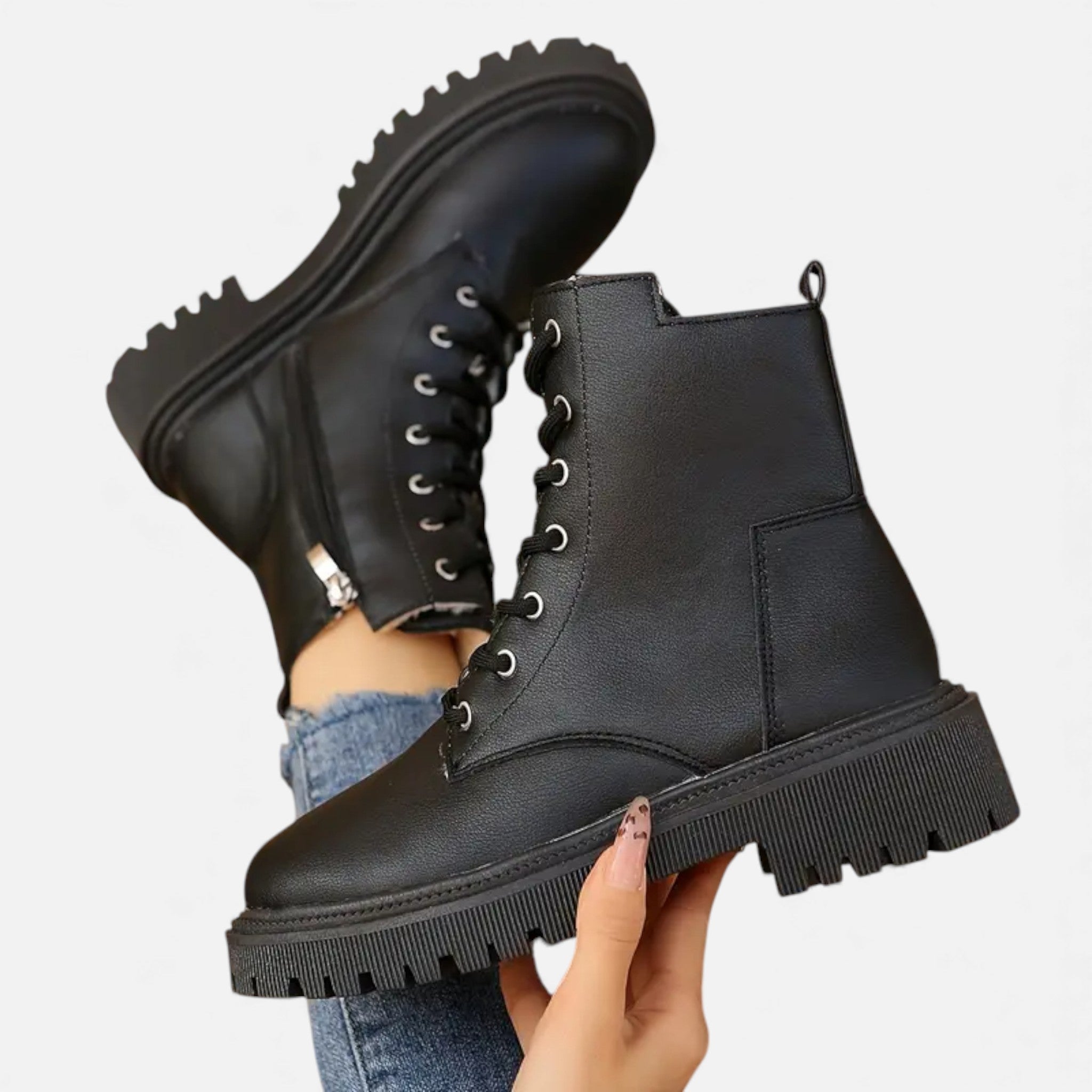 Black PU leather women's ankle boots with lace-up detail – angled three-quarter view