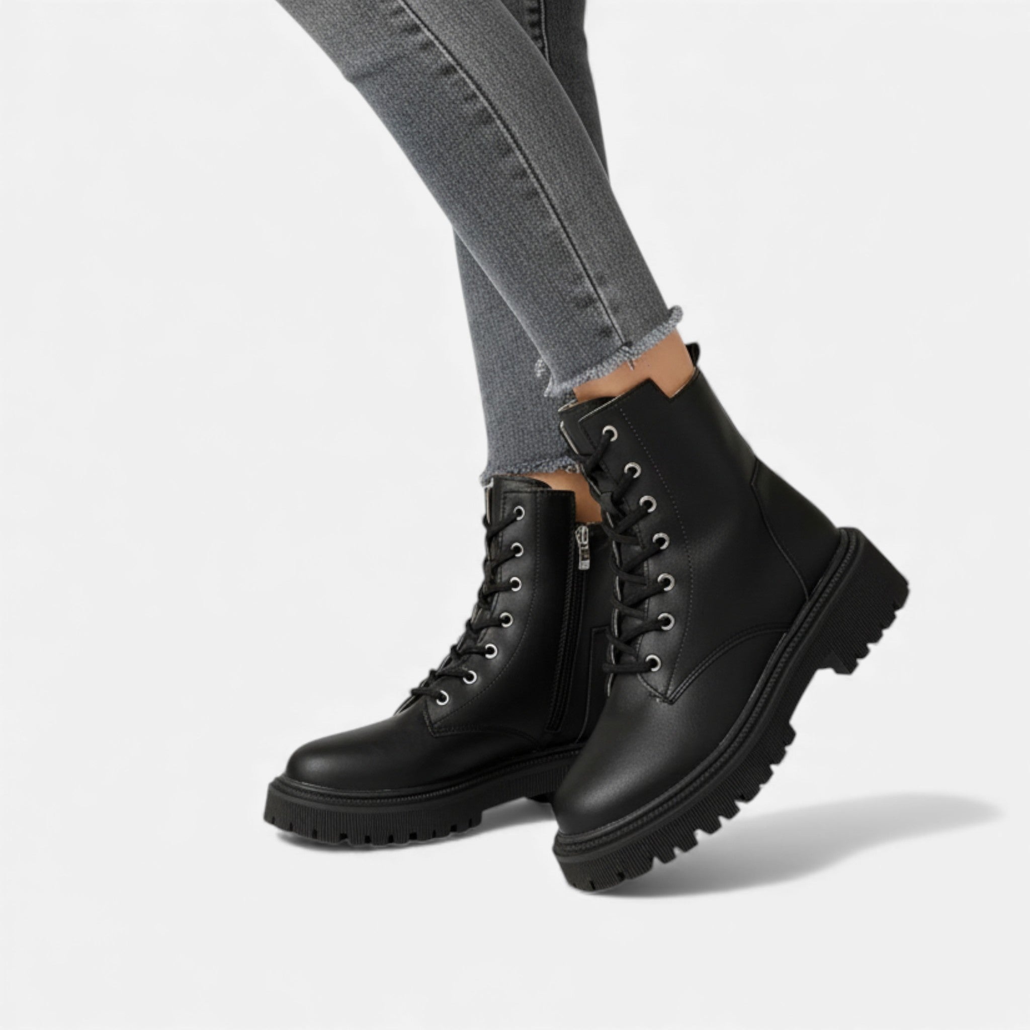 Women's black faux leather ankle boots with lace-up fastening – side profile view