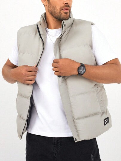 sleeveless padded vest featuring central zip closure detail