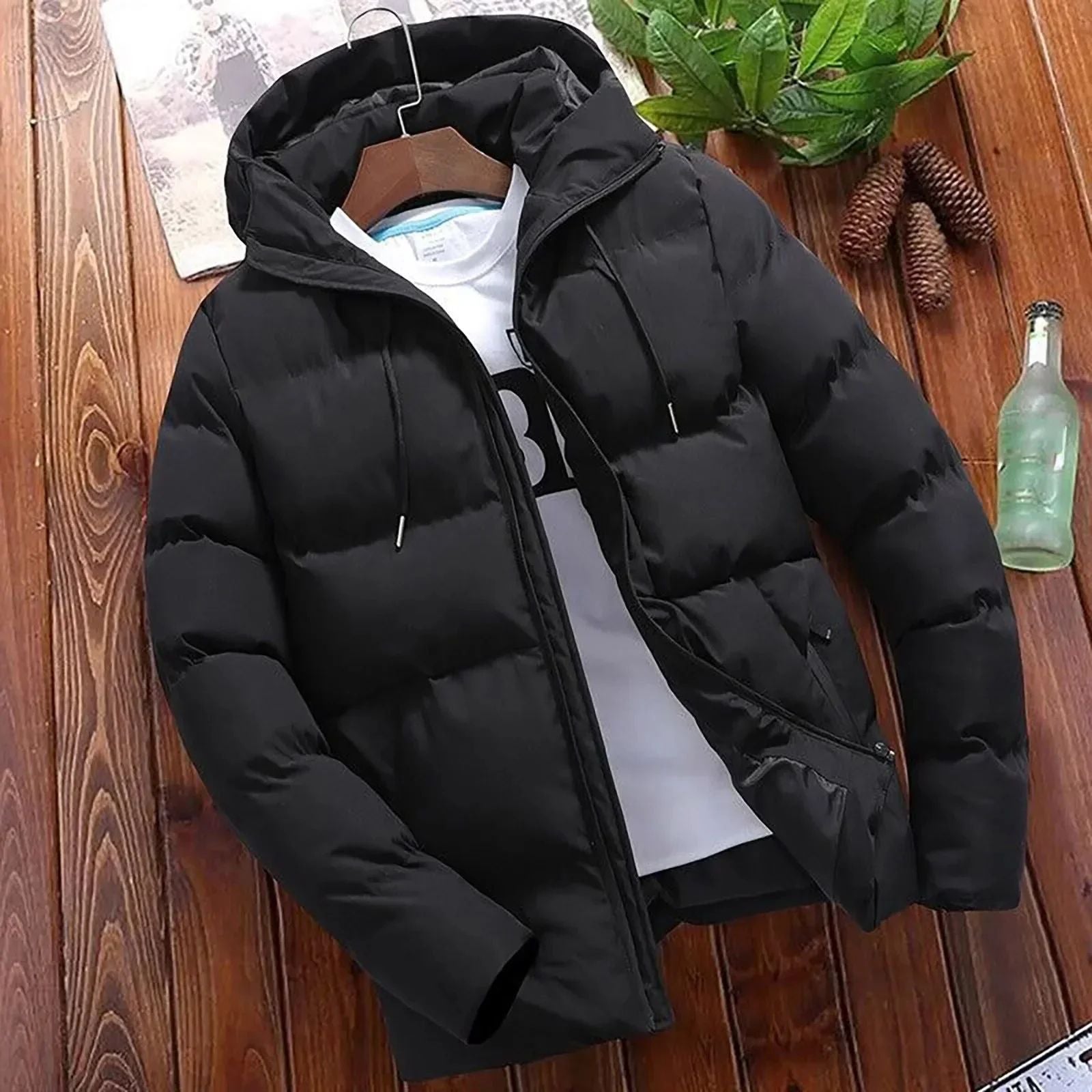 Quilted jacket with hood and zip fastening designed for cold weather protection