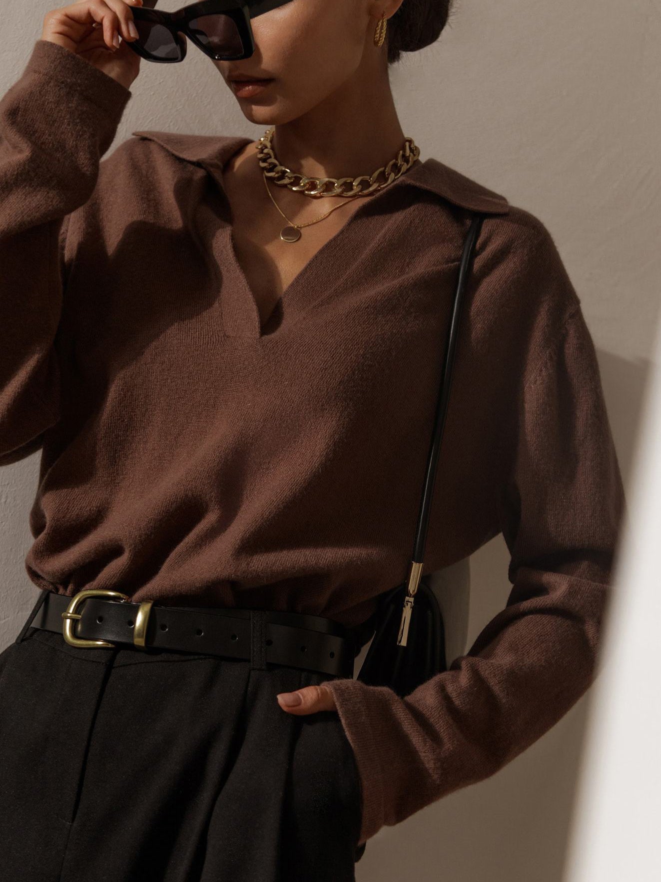 Women's collared knit top showcasing the complete garment silhouette