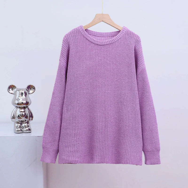Oversized knit jumper shown from back with ribbed hem and cuffs