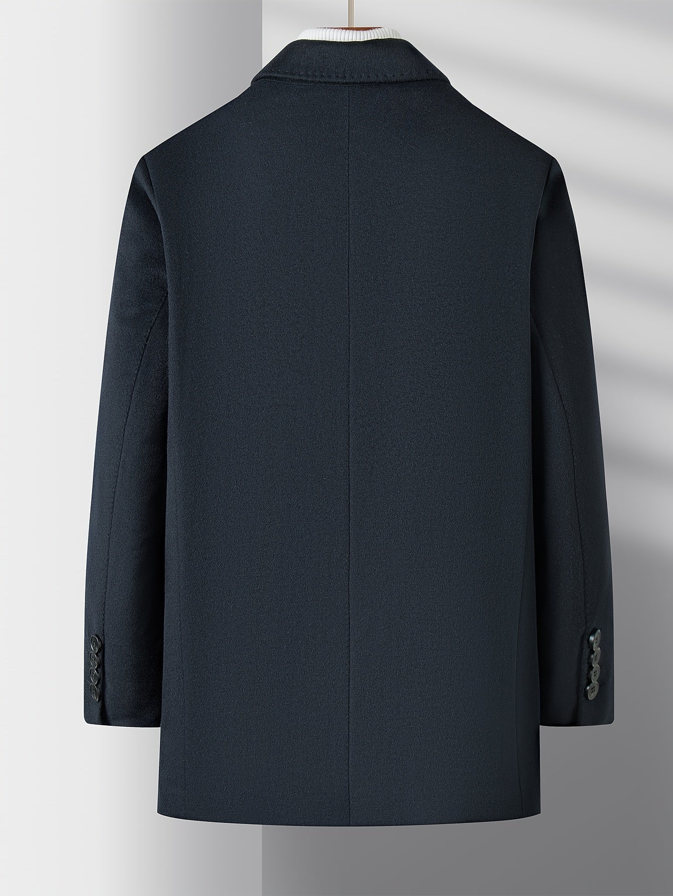 winter overcoat for men featuring structured shoulders and buttons