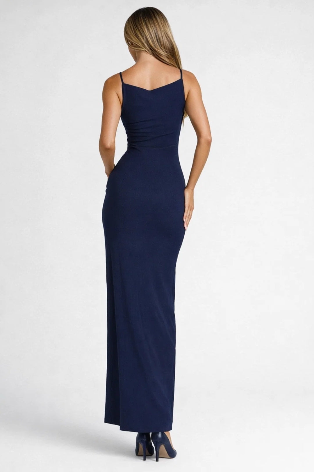 Dark blue sleeveless maxi dress with back tie closure and side split detail, back view