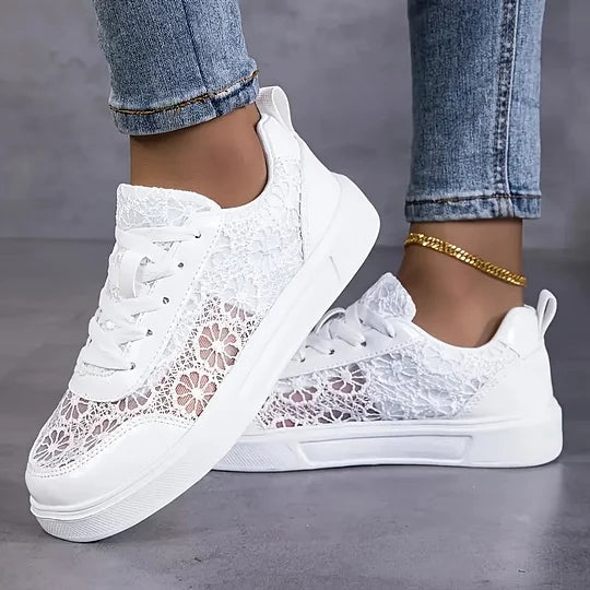 Women's white lace-up mesh sneakers, side view, low-top casual style