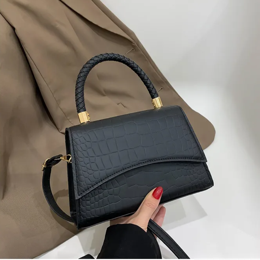 Synthetic leather handbag with top handle and adjustable strap for women