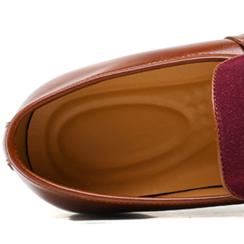 Men's penny loafers shown from the back, displaying the heel and sole construction — Montelu