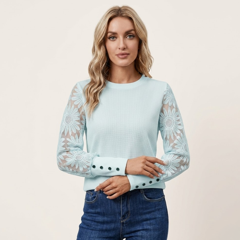 Women's textured knit top showcasing lace sleeve detailing