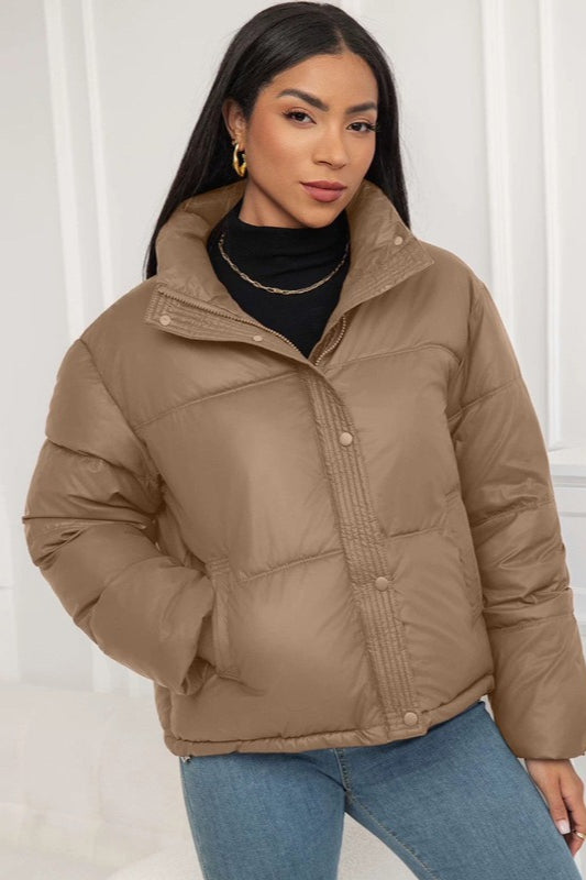 Insulated jacket with snap button closure and relaxed fit