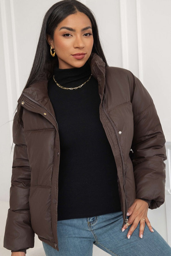 Padded jacket with high collar and zip fastening for women