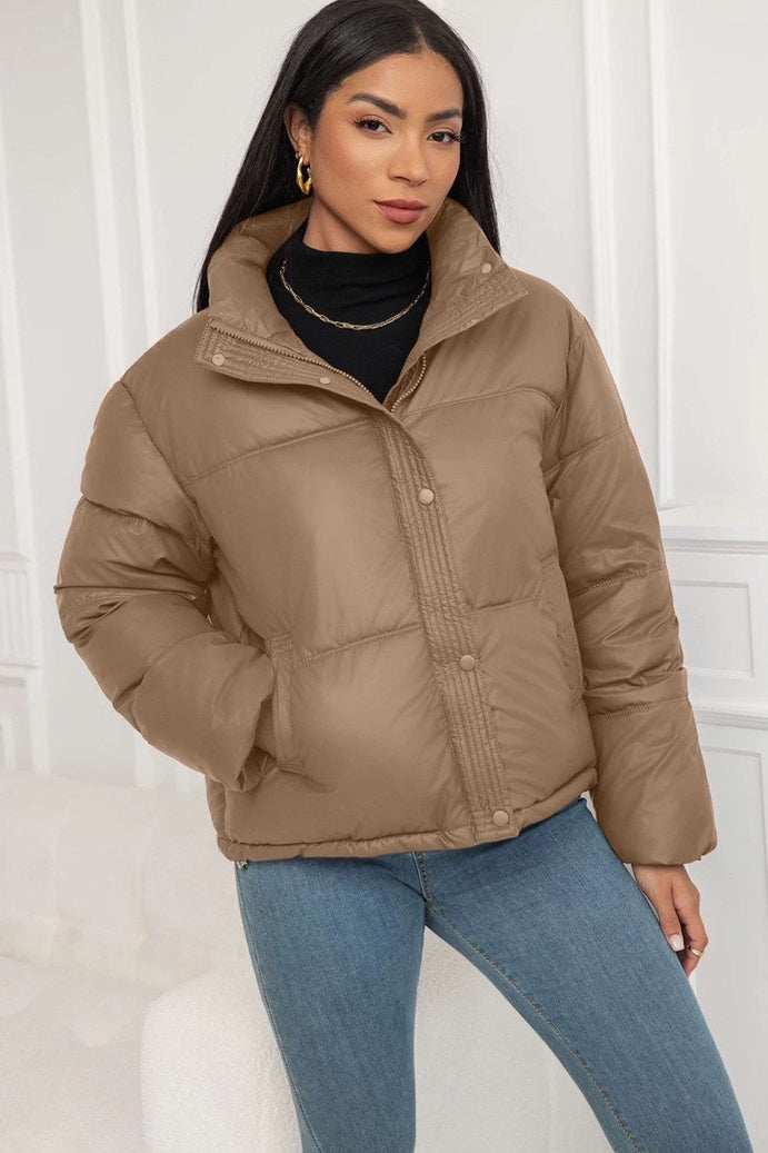 Puffer jacket with elasticated hem and loose fit styling