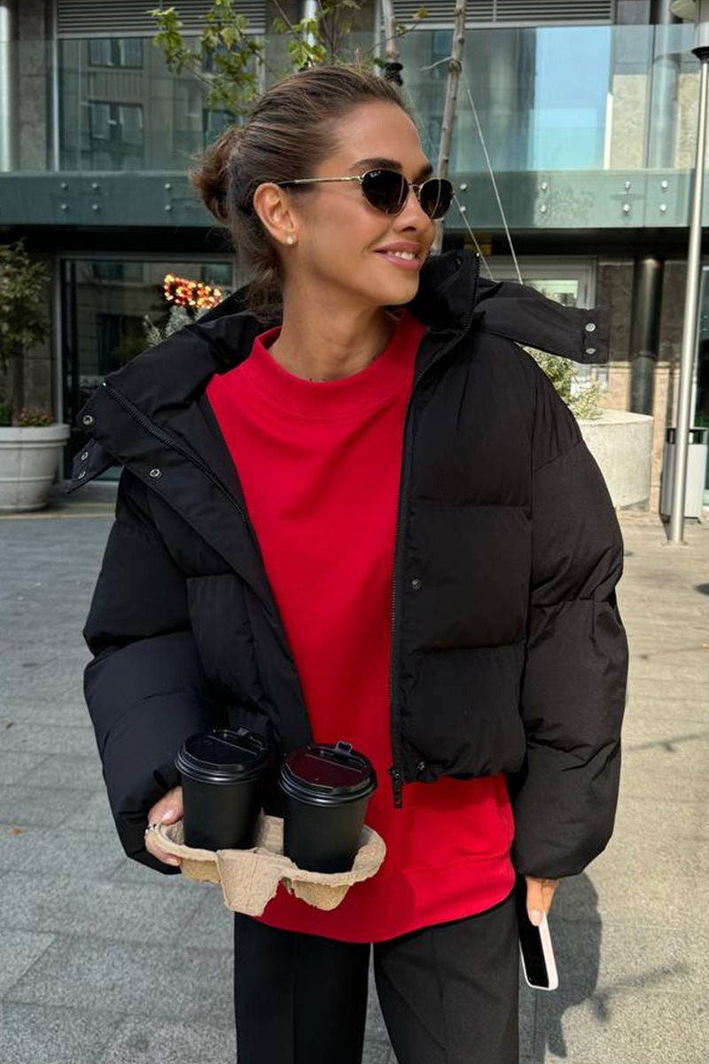 Puffer jacket back view relaxed fit women