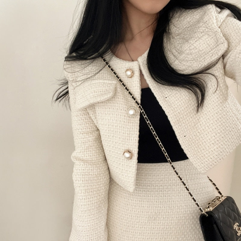 Women's white two-piece blazer skirt suit — button closure blazer with coordinated zip-fastening skirt
