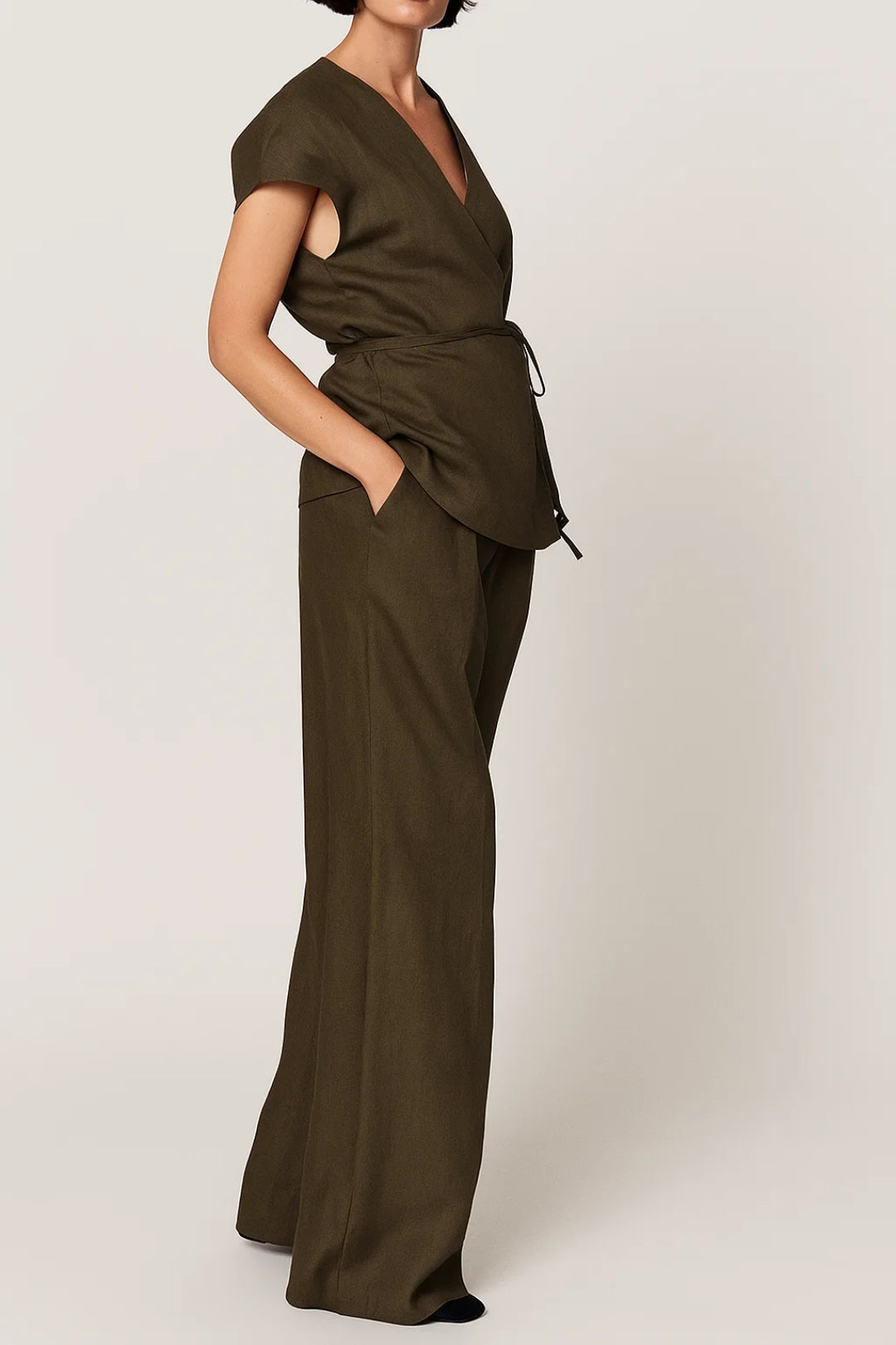 Women's two-piece trouser set featuring a wrap-style short sleeve top