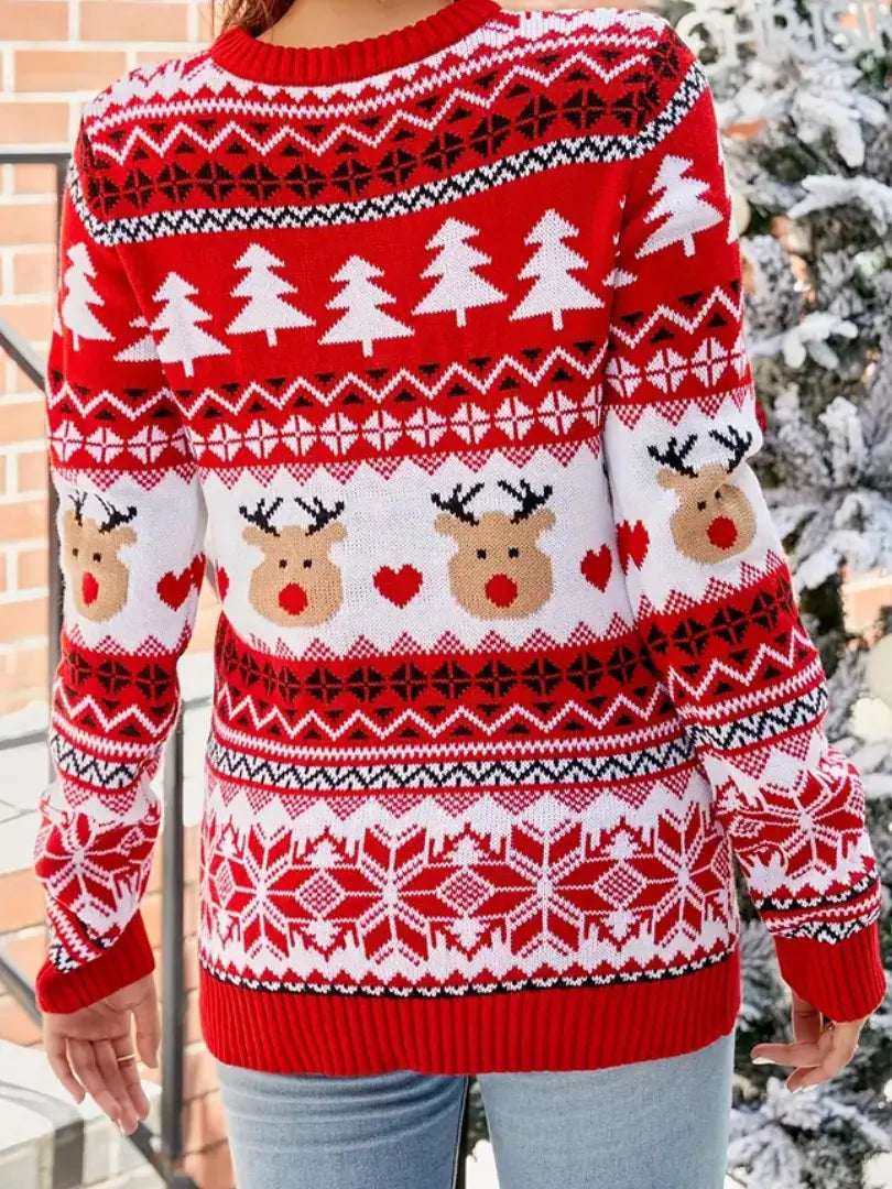 relaxed fit sweater with reindeer and tree pattern layout