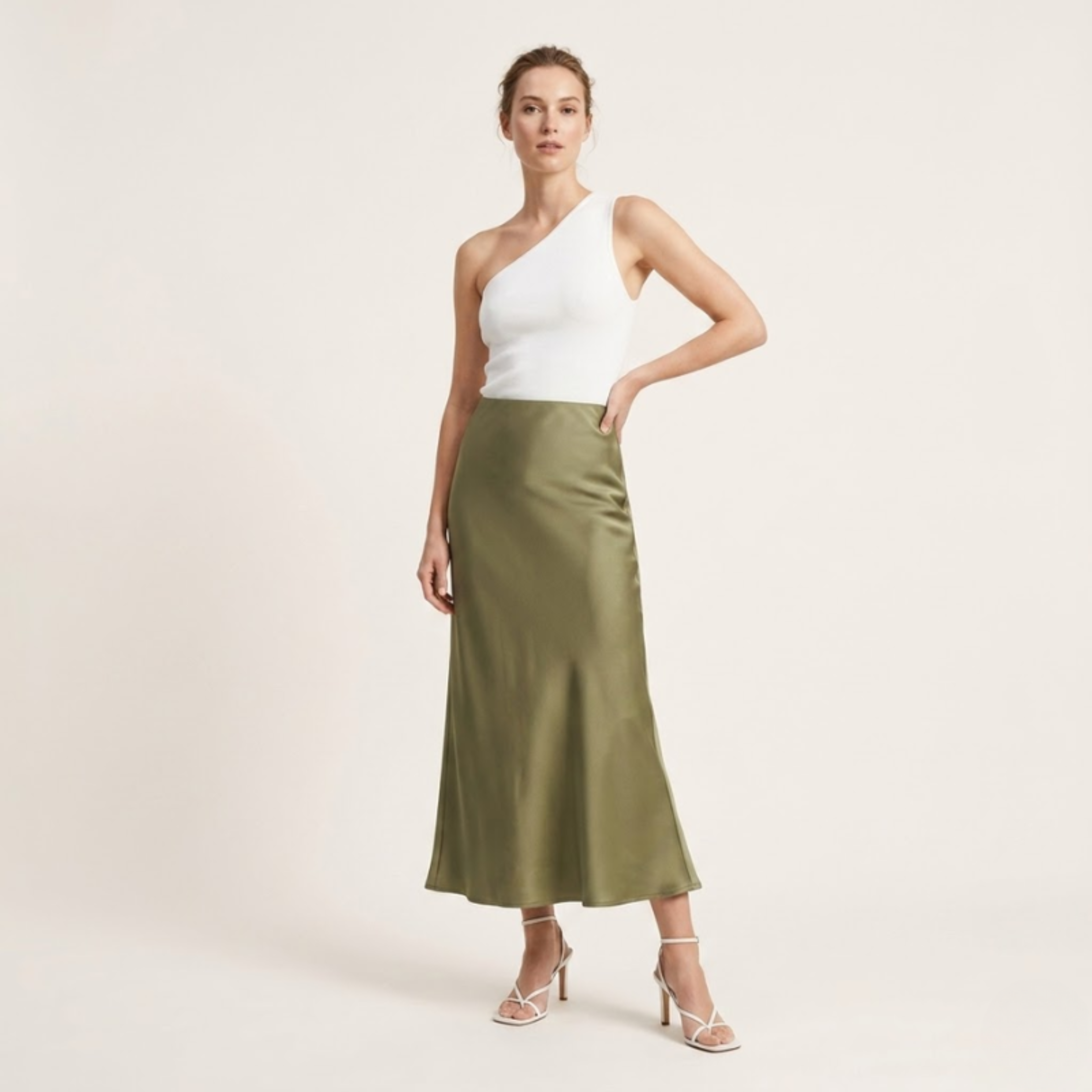 Women's flowing satin midi skirt with elegant movement