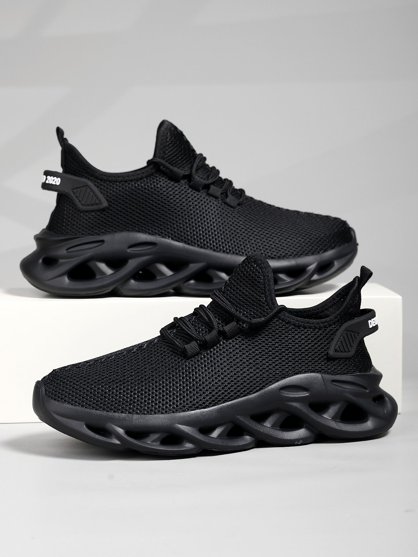 Running shoes with structured side panels and EVA outsole