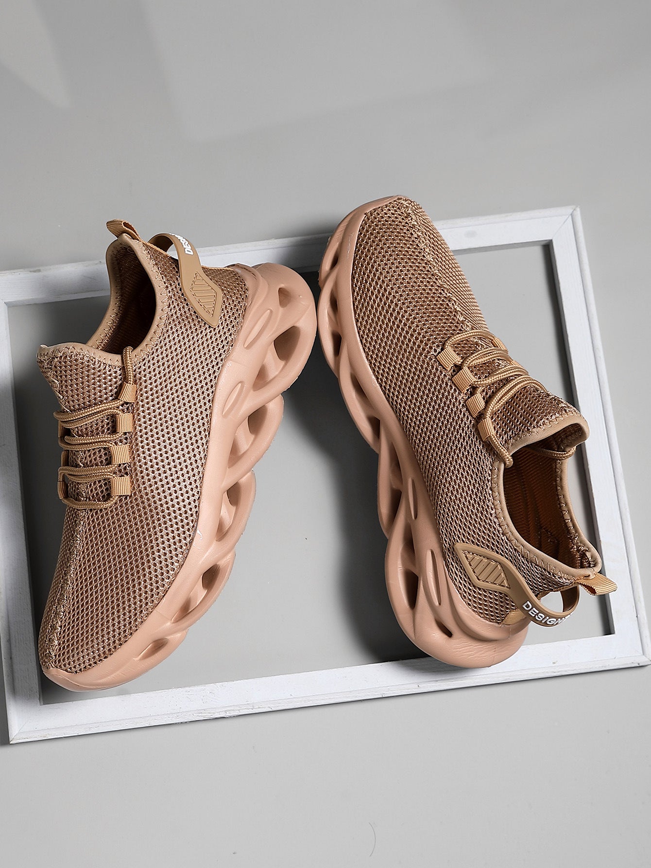 Running shoes with structured side panels and EVA outsole