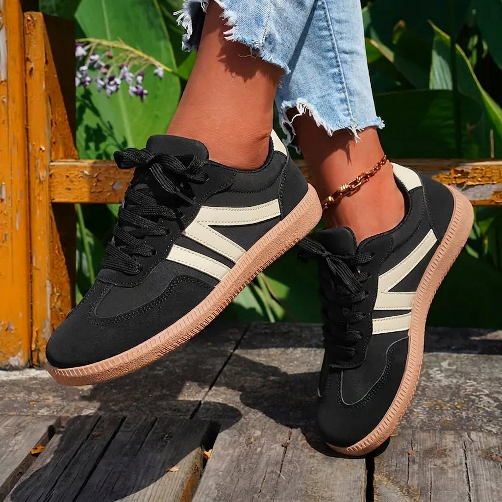 Women's black venice lace-up casual sneakers, low-top silhouette, side view