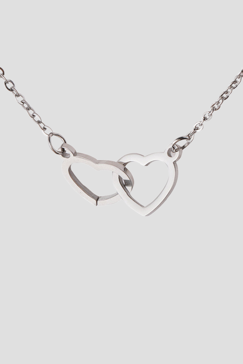 Adjustable necklace with heart-shaped pendant in white gold finish