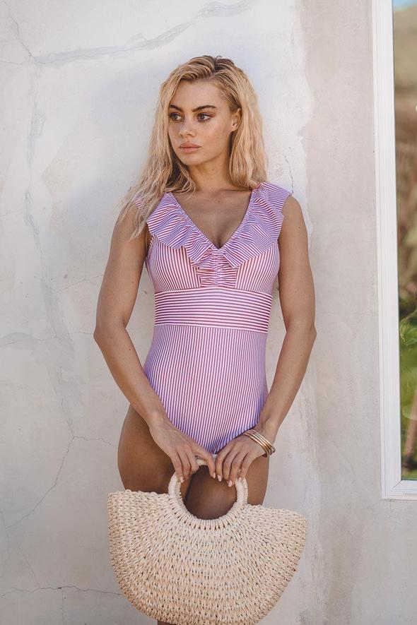 Women's fitted striped swimsuit showcasing the front design