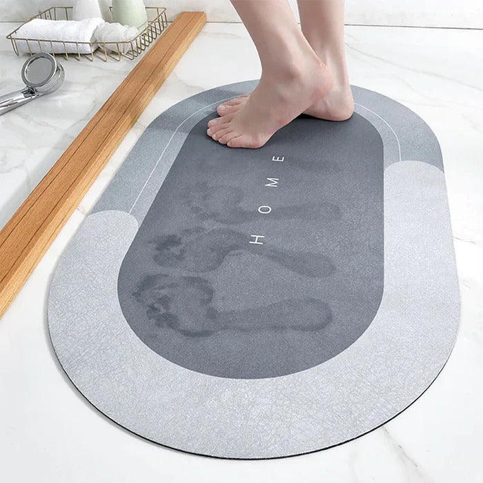 Bath mat in bathroom setting beside shower or tub