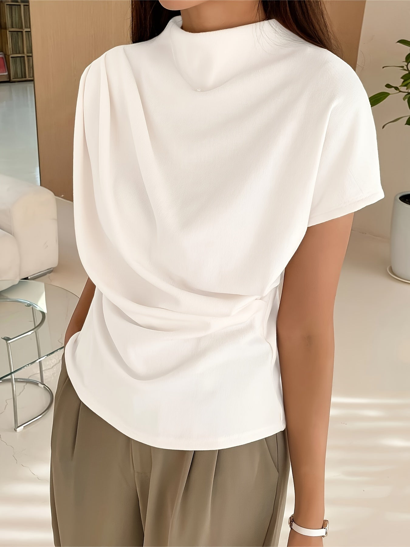 Montelu women's draped neckline top – side or angled front view showing relaxed silhouette