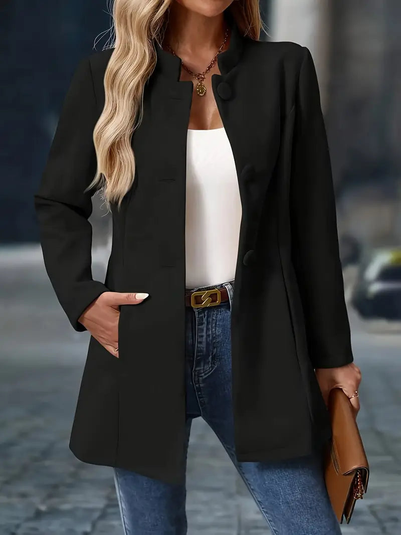 Wool coat back view showing centre vent and tailored fit for women