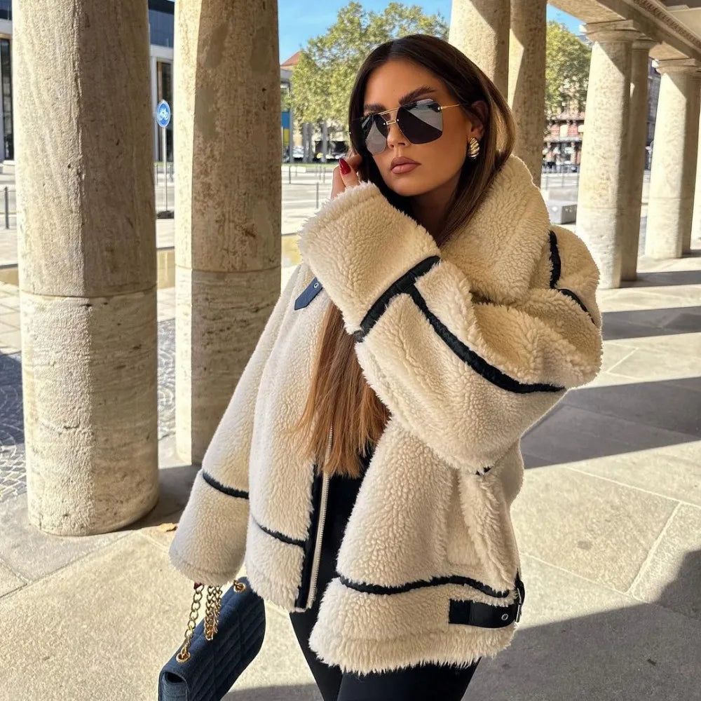 Plush teddy jacket worn with loose comfortable silhouette
