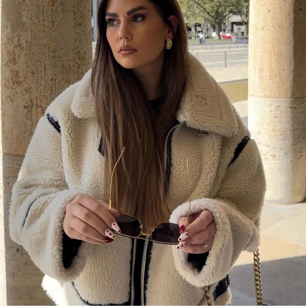 Soft pile outerwear featuring dropped shoulder seam detail