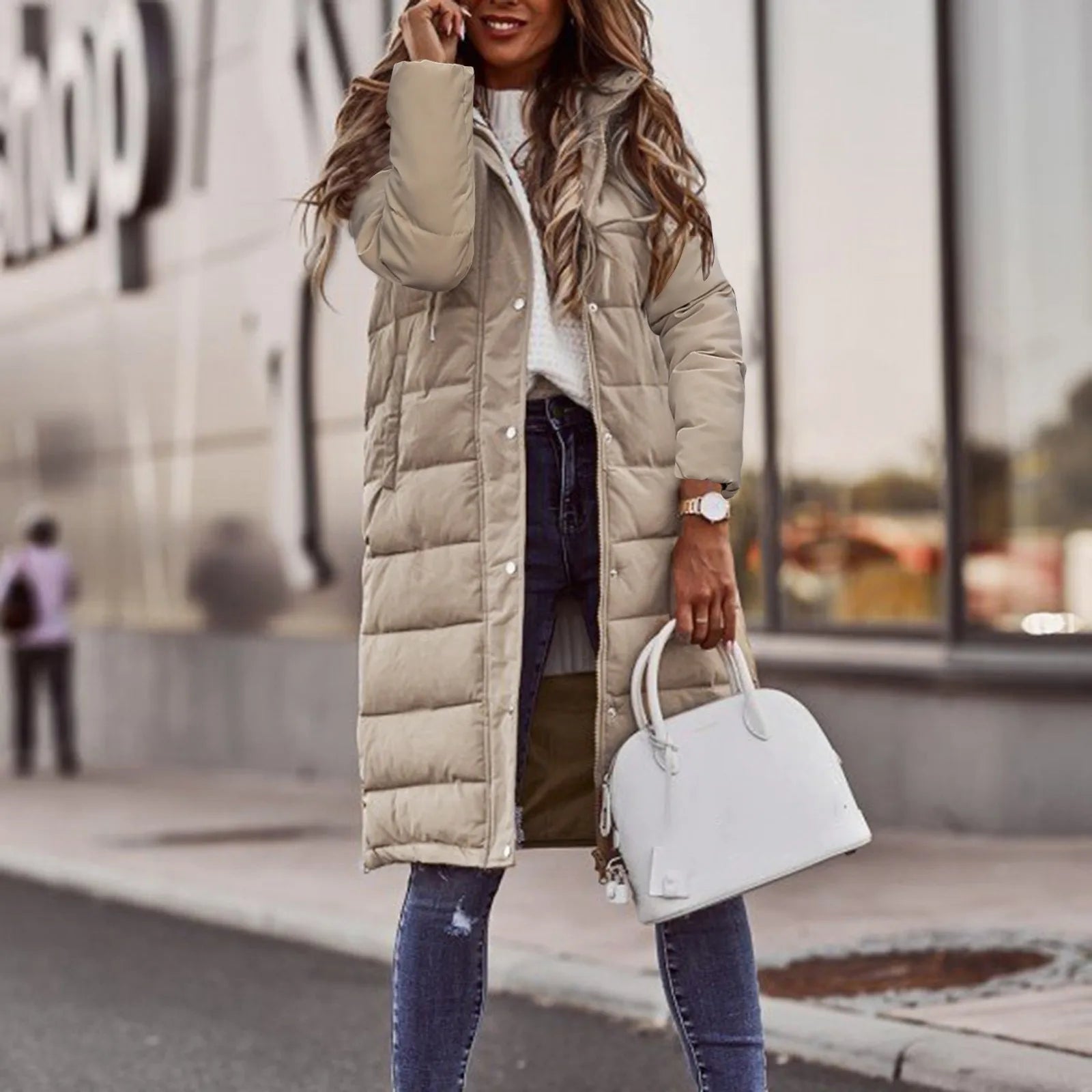 cotton blend padded coat with long sleeves shown from front angle on model