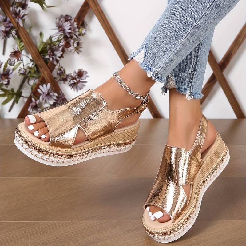 Close-up of women's platform sandal upper strap and open-toe construction in neutral colorway