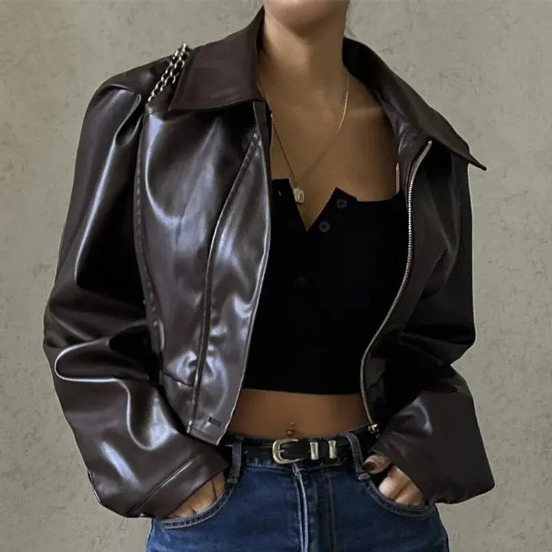 cropped faux leather outerwear with fitted waist on model back view