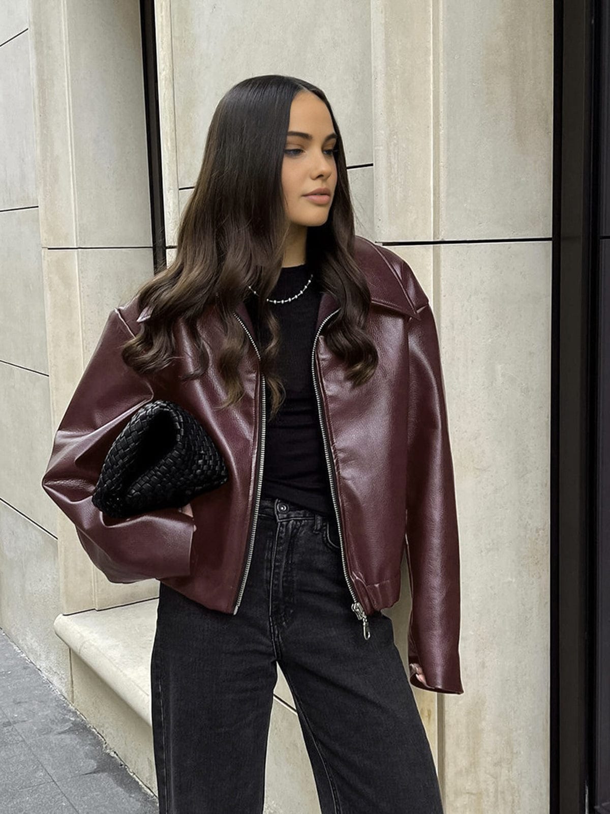 faux leather jacket with front zipper closure and collar detail