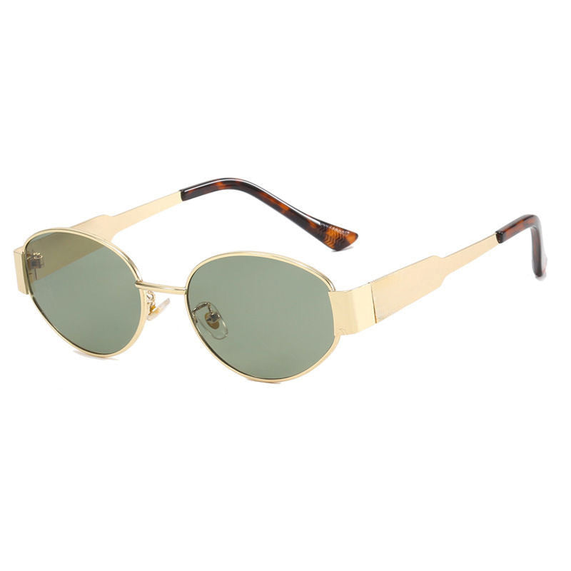 Women's vintage sunglasses in green and gold metal frame, casual and holiday eyewear