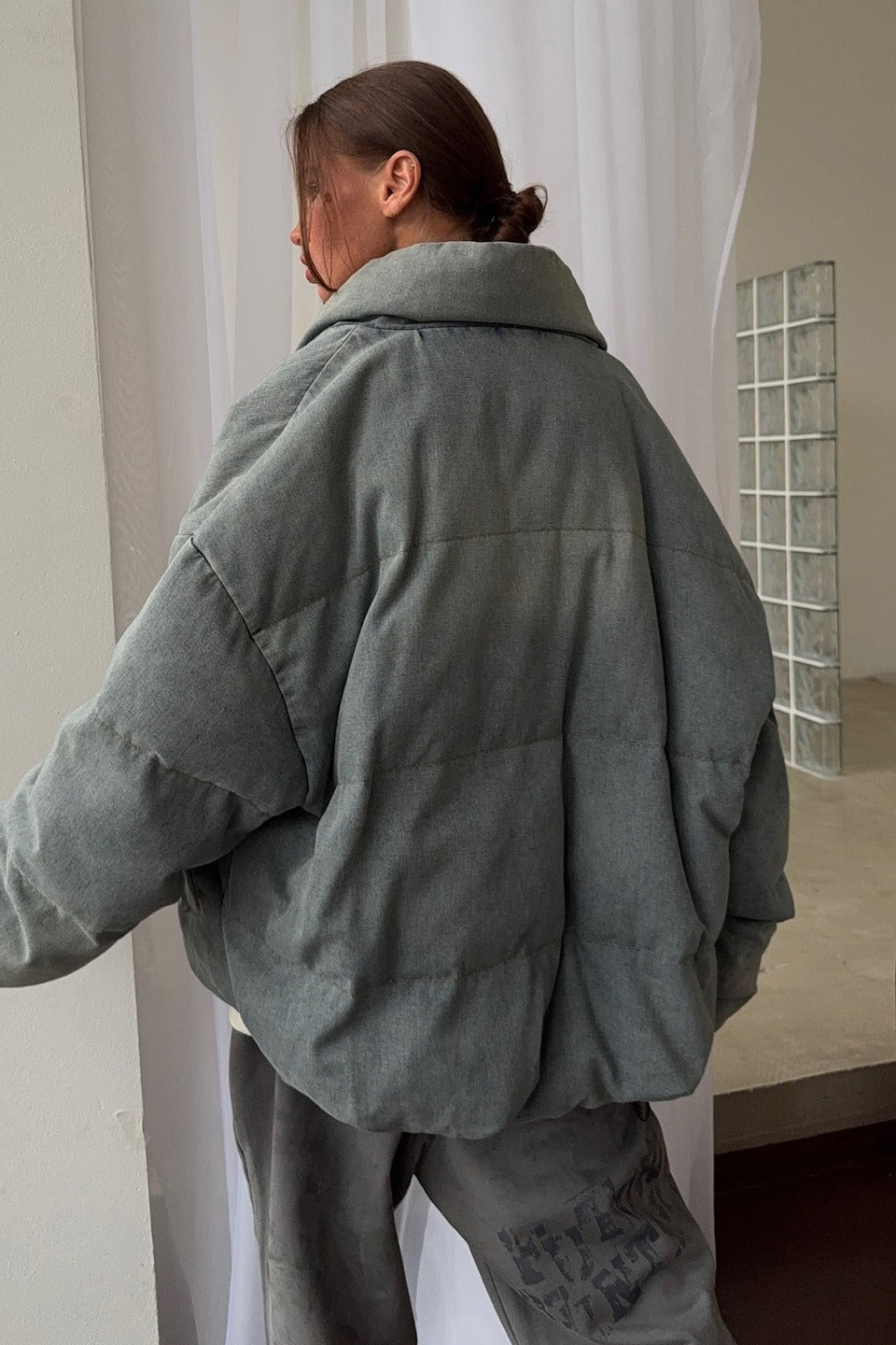 Oversized quilted jacket in denim fabric with stand collar detail