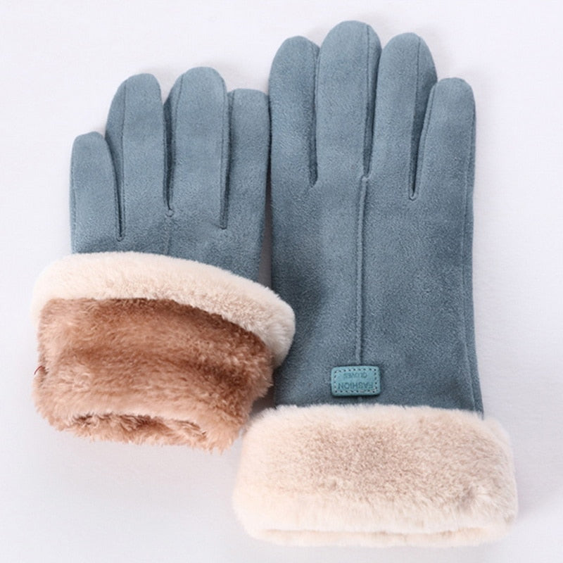 Winter gloves with elasticated wrist closure and thermal insulation detail
